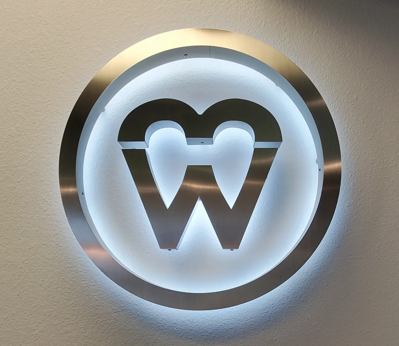 The Waterview Dentistry logo on the office wall